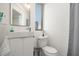 Modern bathroom with a sleek vanity, mirror, and a shower with subway tile at 75 Ponce De Leon Ne Ave # 1004, Atlanta, GA 30308