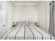 Cozy bedroom featuring a minimalist design with a comfortable bed, sconces and side tables at 75 Ponce De Leon Ne Ave # 1004, Atlanta, GA 30308