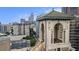 An elevated view of an ornately arched building juxtaposed against the city skyline on a clear day at 75 Ponce De Leon Ne Ave # 1004, Atlanta, GA 30308