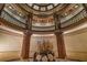 Expansive foyer showcases architectural details, decorative railings, and a stained-glass ceiling dome at 75 Ponce De Leon Ne Ave # 1004, Atlanta, GA 30308