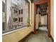 Hallway with window providing views of inner courtyard at 75 Ponce De Leon Ne Ave # 1004, Atlanta, GA 30308