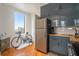 Well-lit kitchen with stainless steel appliances and scenic views from the window at 75 Ponce De Leon Ne Ave # 1004, Atlanta, GA 30308