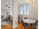 Inviting living and dining area with hardwood floors and large windows offering ample natural light at 75 Ponce De Leon Ne Ave # 1004, Atlanta, GA 30308
