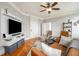 Cozy living room with ceiling fan, TV, and comfortable seating at 75 Ponce De Leon Ne Ave # 1004, Atlanta, GA 30308