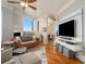 Bright living room with hardwood floors, modern furnishings, and natural light at 75 Ponce De Leon Ne Ave # 1004, Atlanta, GA 30308