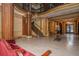 Elegant lobby featuring stairs, marble floors, columns, and classic architectural details at 75 Ponce De Leon Ne Ave # 1004, Atlanta, GA 30308