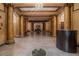 Elegant lobby with marble floors, columns, chandelier, and reception area at 75 Ponce De Leon Ne Ave # 1004, Atlanta, GA 30308