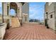 Spacious rooftop terrace with elegant staircases, neutral paving, and city views in the background at 75 Ponce De Leon Ne Ave # 1004, Atlanta, GA 30308