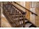 Detailed staircase with decorative railing and marble wall at 75 Ponce De Leon Ne Ave # 1004, Atlanta, GA 30308