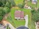 Aerial view of the home on a manicured lot at 1613 Brolington Ct, Conyers, GA 30013