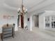 Dining room with a decorative chandelier, arched doorways, and lots of wall decor to add character at 1613 Brolington Ct, Conyers, GA 30013