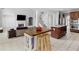 Open floor plan seamlessly connects the kitchen and living room, perfect for entertaining at 1613 Brolington Ct, Conyers, GA 30013