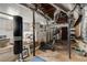 Unfinished basement with fitness equipment and potential for recreation at 311 Glendale Ave, Decatur, GA 30030