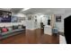 Finished basement featuring hardwood floors, a sofa, a desk, and a decorated wall at 311 Glendale Ave, Decatur, GA 30030