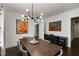 Inviting dining room with modern lighting, sleek sideboard with wine cooler, and stylish decor at 311 Glendale Ave, Decatur, GA 30030