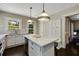 Cozy kitchen features marble countertops, stainless steel appliances, and backyard access at 311 Glendale Ave, Decatur, GA 30030