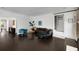 Spacious living room with dark hardwood floors, white walls, and stylish furnishings at 311 Glendale Ave, Decatur, GA 30030
