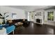 Bright living room with fireplace, hardwood floors, and large windows at 311 Glendale Ave, Decatur, GA 30030