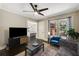 Comfortable living room with a large window overlooking the backyard at 311 Glendale Ave, Decatur, GA 30030