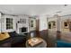 Elegant living room featuring hardwood floors, fireplace, and archway at 311 Glendale Ave, Decatur, GA 30030