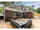 Brick home with a cozy patio, comfortable seating, and perfect outdoor living at 311 Glendale Ave, Decatur, GA 30030