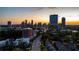 Stunning aerial view of the neighborhood with the city skyline in the distance at 3663 Brookhaven Manor Crossing Ne, Atlanta, GA 30319