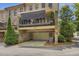 Charming townhouse featuring a garage, and a covered outdoor balcony at 3663 Brookhaven Manor Crossing Ne, Atlanta, GA 30319
