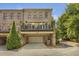 Stunning townhouse with a spacious two-car garage and an inviting outdoor balcony at 3663 Brookhaven Manor Crossing Ne, Atlanta, GA 30319