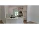 Bright kitchen boasts new appliances, stone countertops, subway tile backsplash, and custom cabinets at 5502 Lakeview Parkway, Villa Rica, GA 30180