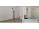 Open-concept living area with high ceilings, hardwood flooring, modern lighting, and plenty of natural light at 5502 Lakeview Parkway, Villa Rica, GA 30180