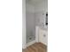 Walk-in shower features white subway tile, a built-in seat, and glass door at 5502 Lakeview Parkway, Villa Rica, GA 30180