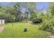 View of a lush backyard with mature trees, creating a private outdoor space at 1908 E Roxboro Ne Rd, Atlanta, GA 30324