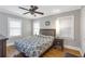 Bedroom with natural light, hardwood floors, neutral walls, and a ceiling fan at 1908 E Roxboro Ne Rd, Atlanta, GA 30324