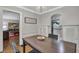 Bright dining room with chandelier and hardwood floors at 1908 E Roxboro Ne Rd, Atlanta, GA 30324