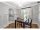 Elegant dining room with chandelier and hardwood floors at 1908 E Roxboro Ne Rd, Atlanta, GA 30324