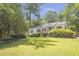 Charming single-story home with a well-manicured front lawn and inviting entrance at 1908 E Roxboro Ne Rd, Atlanta, GA 30324