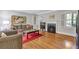 Spacious living room featuring hardwood floors, fireplace and neutral decor at 1908 E Roxboro Ne Rd, Atlanta, GA 30324