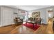 Comfortable living room with hardwood floors, ample seating and natural light at 1908 E Roxboro Ne Rd, Atlanta, GA 30324