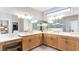 Bright bathroom featuring a large vanity with double sinks and plenty of storage at 313 Sobeck Way, Canton, GA 30115