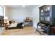 Comfortable guest bedroom with a daybed, antique desk and hutch, and neutral decor at 313 Sobeck Way, Canton, GA 30115