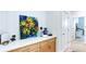 Hallway features artwork on the wall, with view into another room at 313 Sobeck Way, Canton, GA 30115