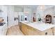Kitchen featuring a large island, stainless steel appliances, gas range, and open design for entertaining at 313 Sobeck Way, Canton, GA 30115