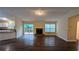 Spacious living room featuring a fireplace and sliding glass doors to the deck at 3646 Salem Dr, Lithonia, GA 30038