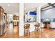Open-concept kitchen featuring breakfast bar with elegant finishings at 317 Red Gate Overlook, Canton, GA 30115