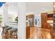 Spacious kitchen with dark wood cabinets, stainless steel appliances, breakfast bar and hardwood floors at 317 Red Gate Overlook, Canton, GA 30115