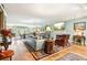 Bright living room with a fireplace, hardwood floors, and comfortable seating at 317 Red Gate Overlook, Canton, GA 30115