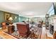 Open living area with a fireplace, hardwood floors, and ample seating at 317 Red Gate Overlook, Canton, GA 30115