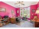 Bright office space with pink walls, natural light from the windows, and ample desk space at 317 Red Gate Overlook, Canton, GA 30115