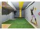 Unique basement converted into an indoor baseball practice area at 3705 Williams Point Dr, Cumming, GA 30028