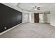 Spacious bedroom has a barn door leading to the primary bathroom at 3705 Williams Point Dr, Cumming, GA 30028